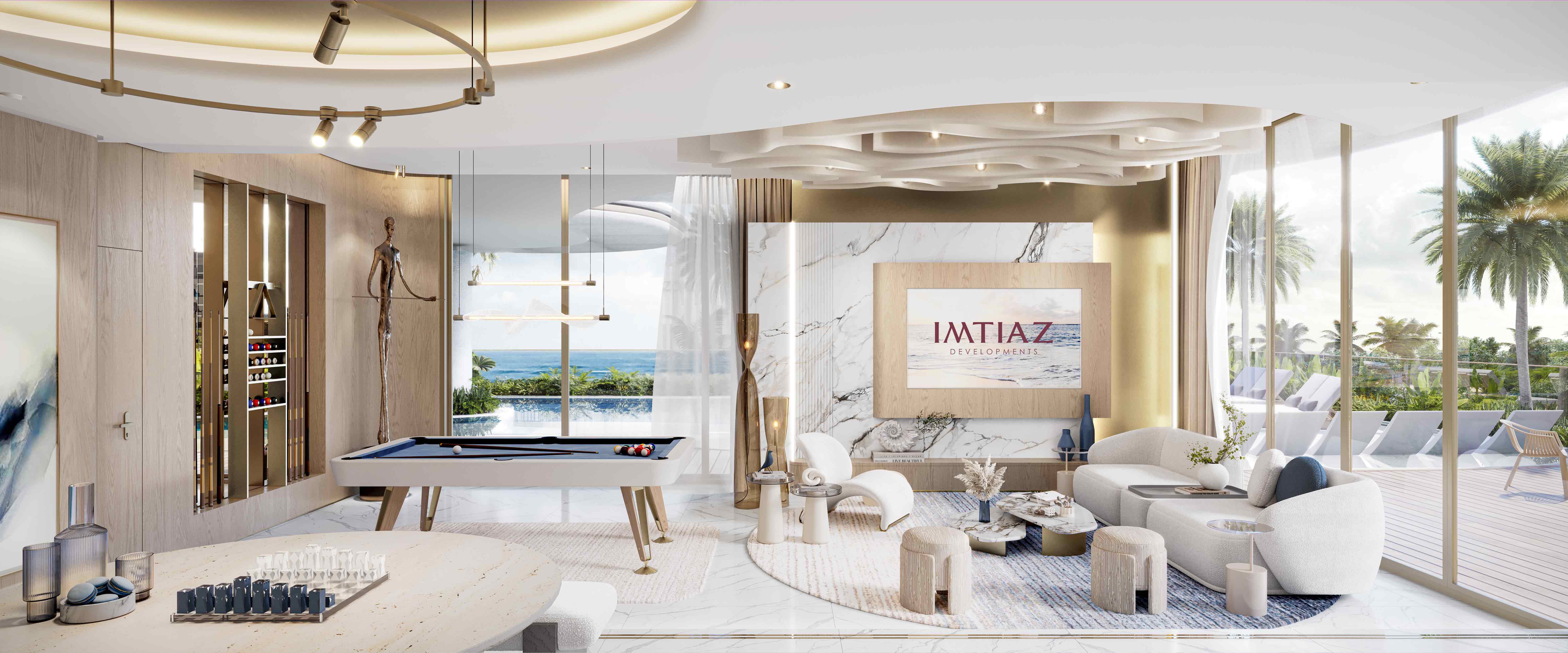 Sunset Bay Grand By Imtiaz A modern living space featuring elegant furnishings, a pool table, ocean views, and stylish decor elements.